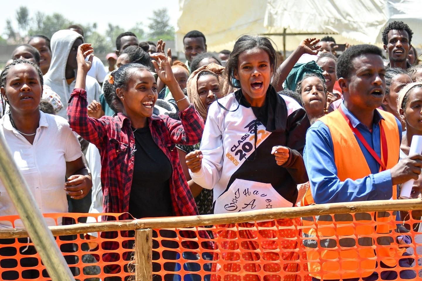 Crowd responding at a Gospel crusade