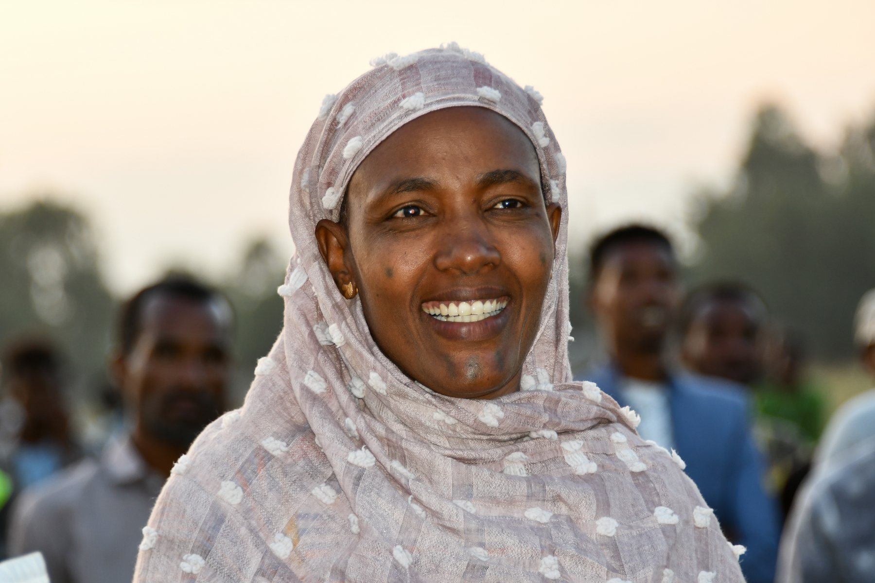 Smiling woman at a Gospel crusade